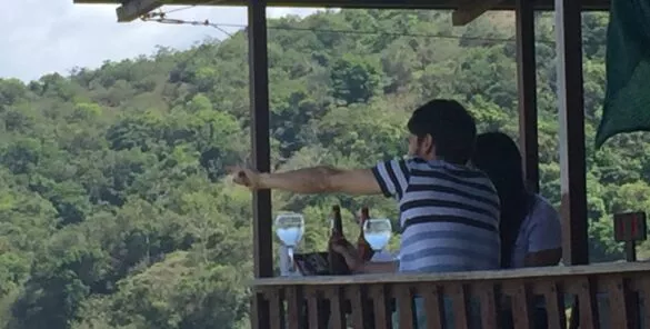 Drinking wine and beer with sight from mountains in Costa Rica