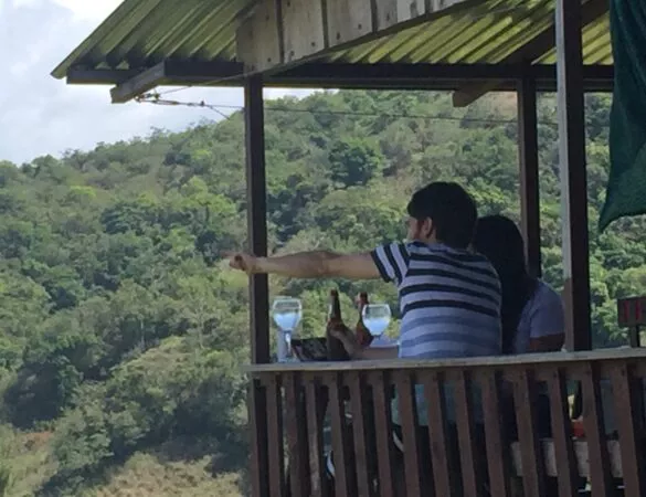 Drinking wine and beer with sight from mountains in Costa Rica
